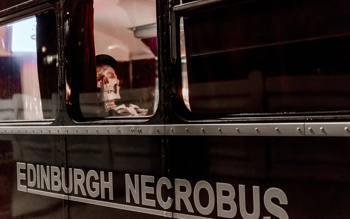 The black Edinburgh Necrobus with a skeleton in the window