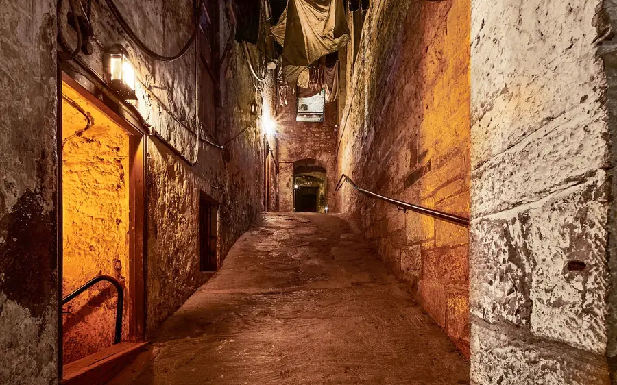 A lit passage inside Mary King's Close under the City Chambers